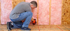 Contractor installing insulation in Sebeka, Minnesota.